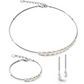 Pearl necklace, bracelet, and earrings on a white background
