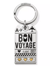 Silver key fob with Bon Voyage written on it