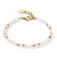 View of a bracelet made from freshwater pearls and rose quartz with gold accents.
