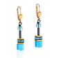 View of a pair of gold, onyx and teal earrings.