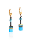 View of a pair of gold, onyx and teal earrings.