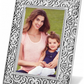 Swirled floral inspired silver picture frame for both portrait and landscape orientation photos.