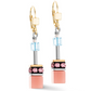 View of GeoCUBE earrings in the colour Aqua and apricot.