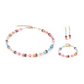 View of a GeoCUBE set in the colour aqua and apricot featuring a necklace, earrings and a bracelet.