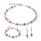 View of the GeoCUBE collection in lilac featuring a necklace, earrings and a bracelet.