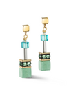 View of a pair of earrings in turquoise and gold 