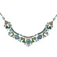 Decorative necklace with green and blue stones on a white background