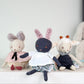 View of three stuffed dolls side by side