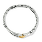 Top view of a silver bracelet with a gold accent with crystals