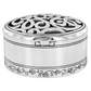 Silver plated trinket box with a gem accent on the latch and an intricate swirl and floral accents.