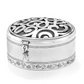 Silver plated trinket box with a gem accent on the latch and an intricate swirl and floral accents.