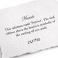 White pillow with text about a 'Forever' talisman by pyrrha on a white background