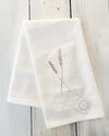 White towel with lavender design 