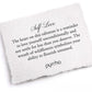 White pillow with text about self-love and pyrrha branding on a white background